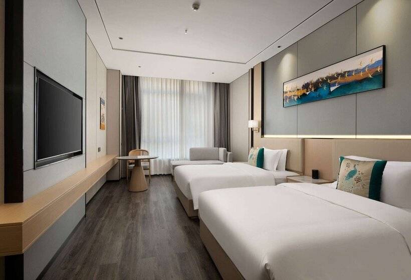 ホテル Ramada Encore By Wyndham Xishuangbanna Jinghong