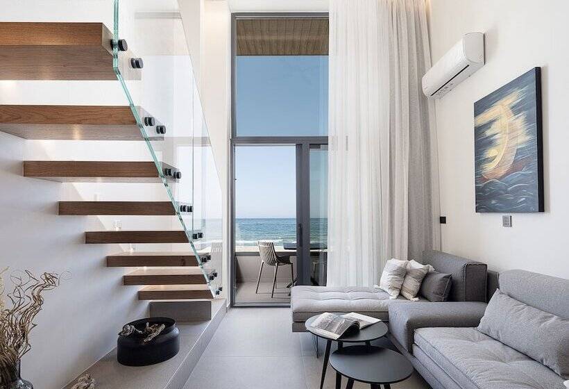 Отель Calla Luxury Seafront Suites