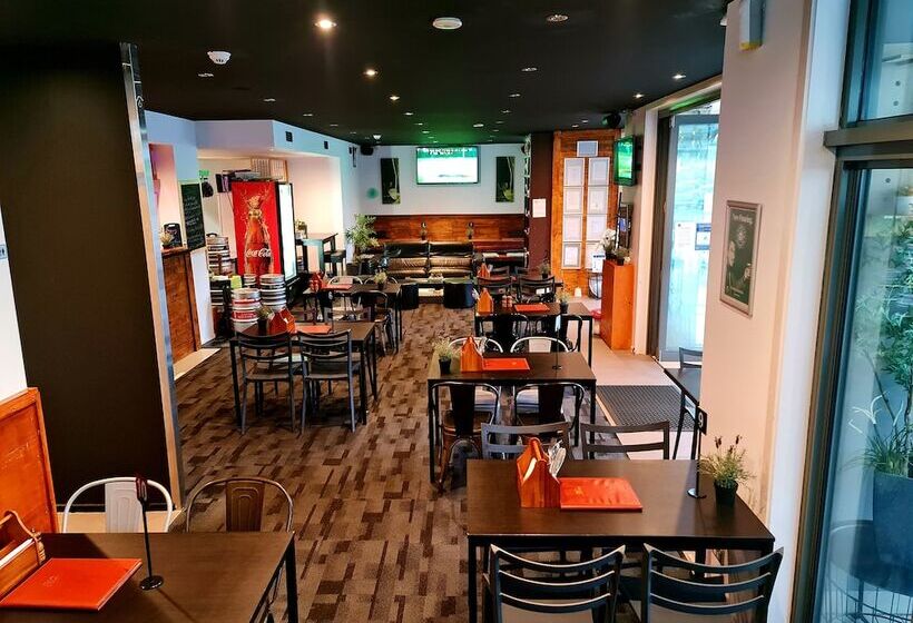 Qure Restaurant & Apartments