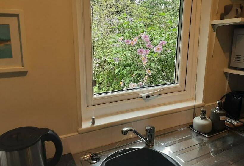 Tranquil Wood Cabin Set In A Beautiful Orchard