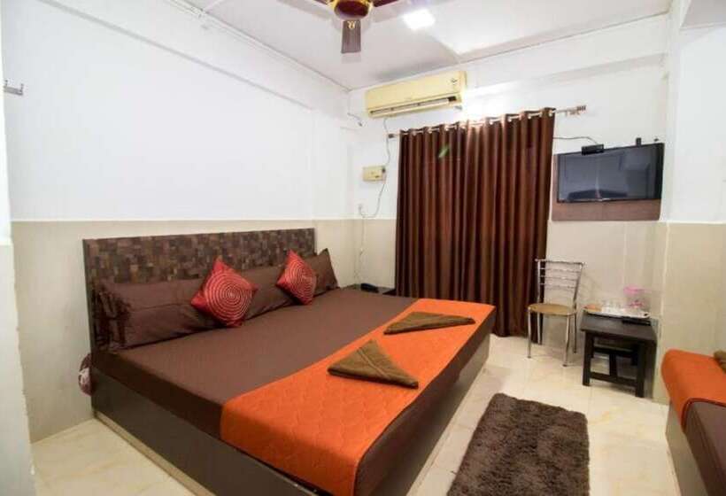 酒店 Goroomgo Travellers Inn Goa