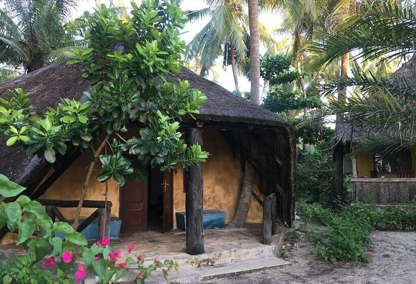 פנסיון Mike S Beach Cottages