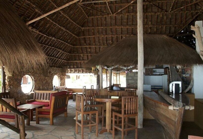 פנסיון Mike S Beach Cottages