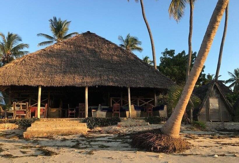 بنسيون Mike S Beach Cottages