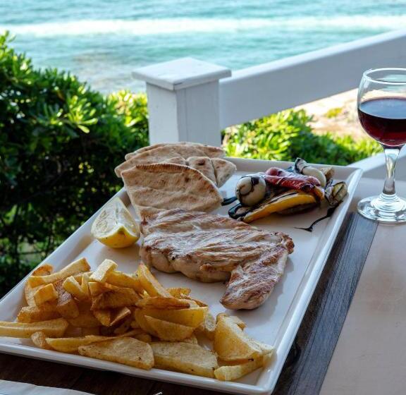 فندق Porto Greco Village Beach