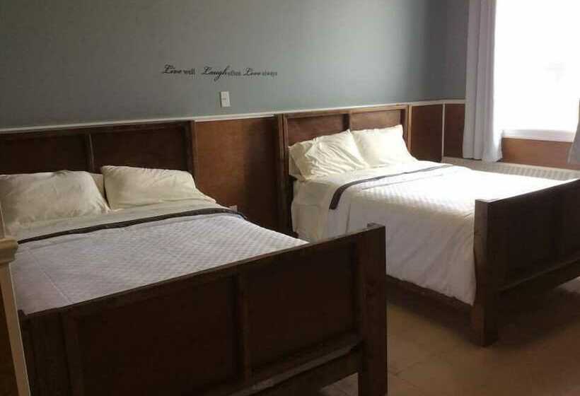 호텔 Genevieve Bay Inn