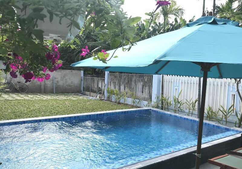 تختخواب و صبحانه The Moon River Homestay & Villa