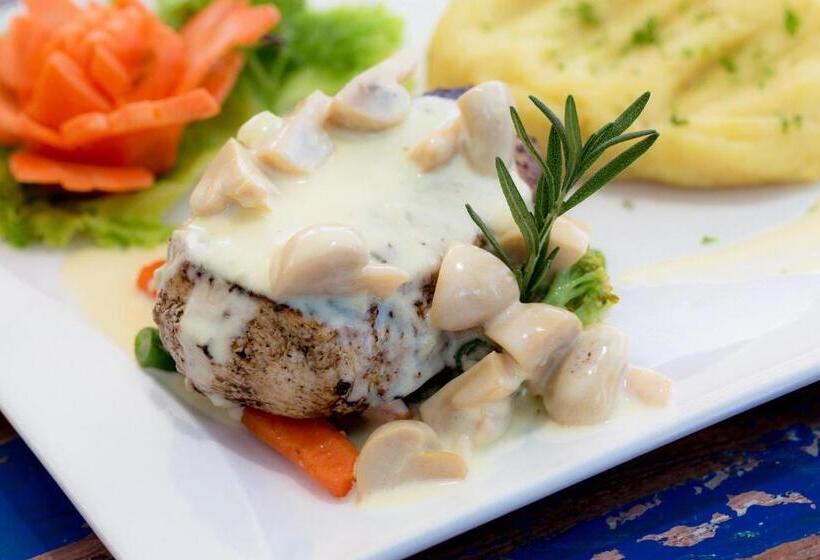 בית מלון כפרי Taman Surgawi Resort & Spa