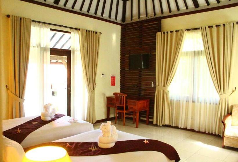 בית מלון כפרי Taman Surgawi Resort & Spa