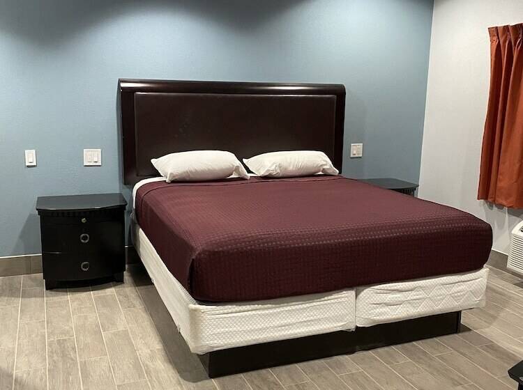 فندق على الطريق Executive Inn