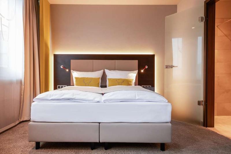 Отель Platzhirsch