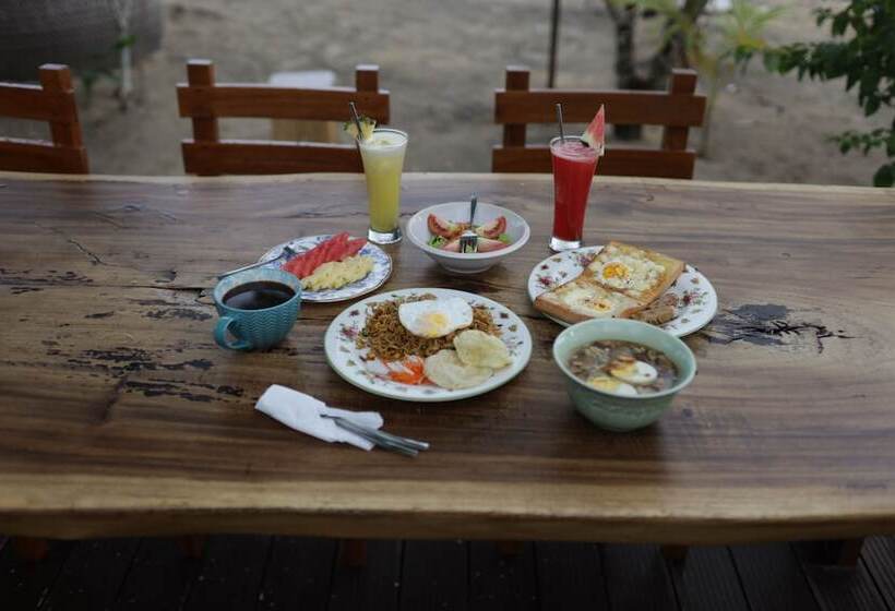 בית מלון כפרי Mambo Beach Resort