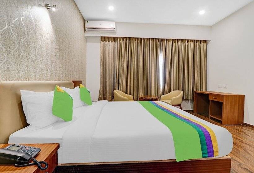 בית מלון כפרי Treebo Trend Shri Aprameya Resort