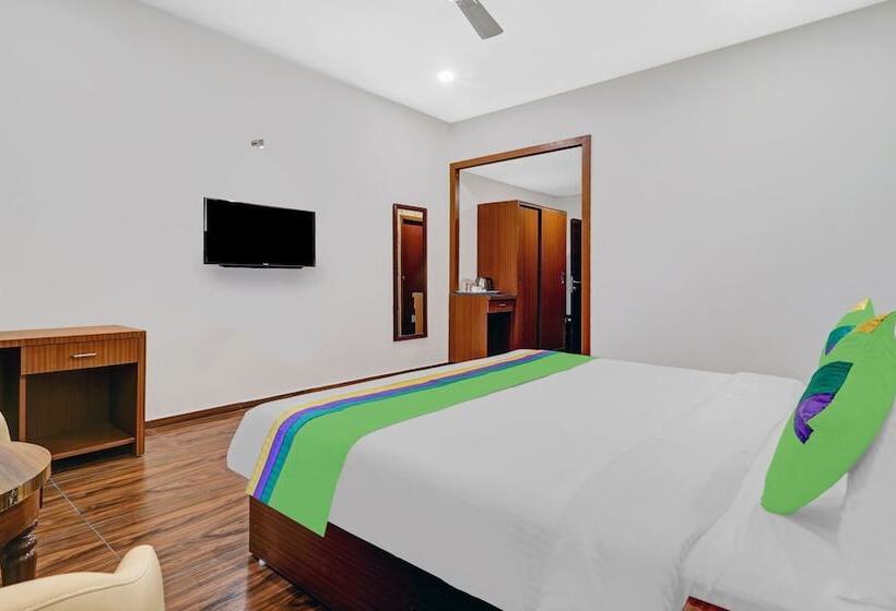 בית מלון כפרי Treebo Trend Shri Aprameya Resort