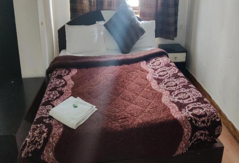 Capital O 8272 Hotel Pratigya Residency