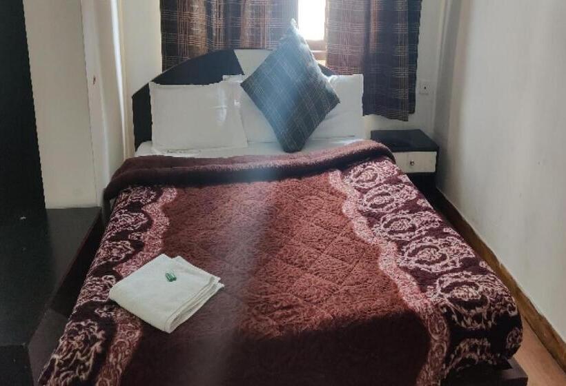 Capital O 8272 Hotel Pratigya Residency