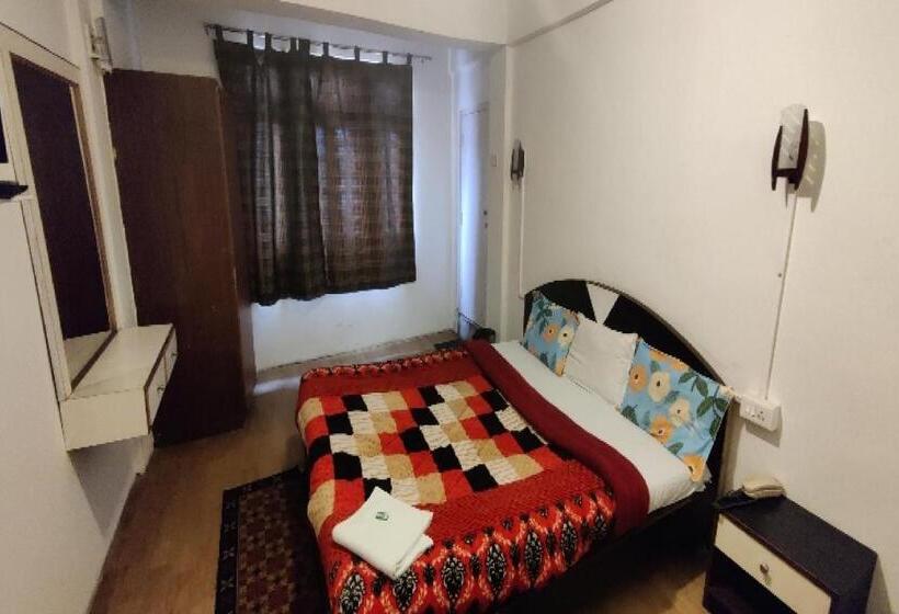 Capital O 8272 Hotel Pratigya Residency