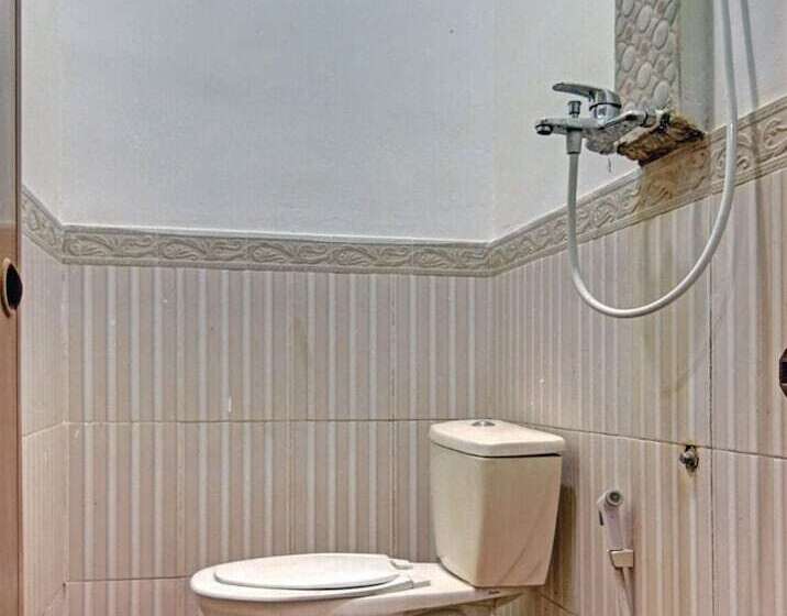 Отель Oyo 90358 Poris Residence Syariah