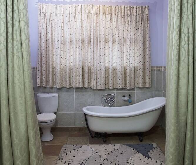 בית מלון כפרי Blue Mango Lodge