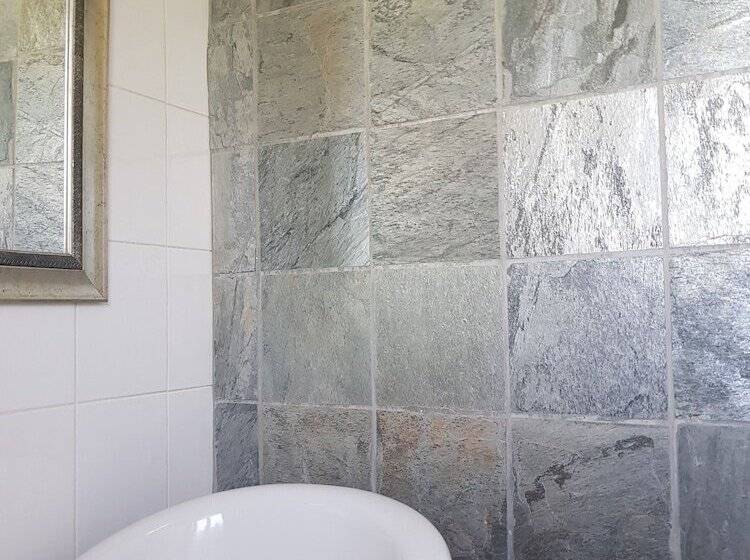 בית מלון כפרי Blue Mango Lodge