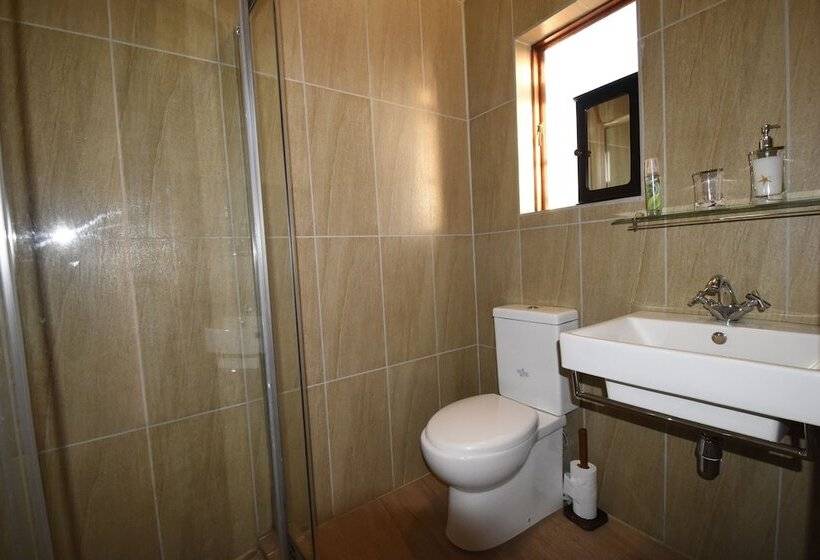 בית מלון כפרי Blue Mango Lodge