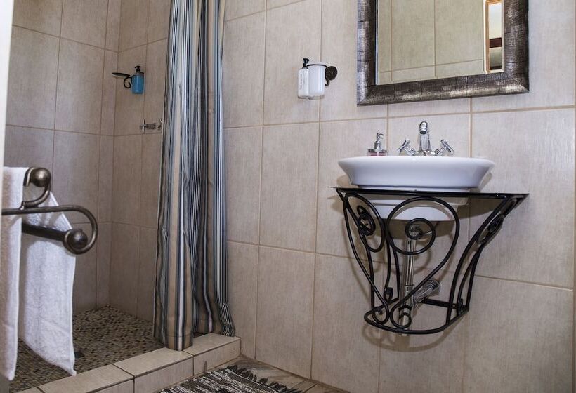 בית מלון כפרי Blue Mango Lodge