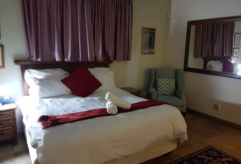 בית מלון כפרי Blue Mango Lodge