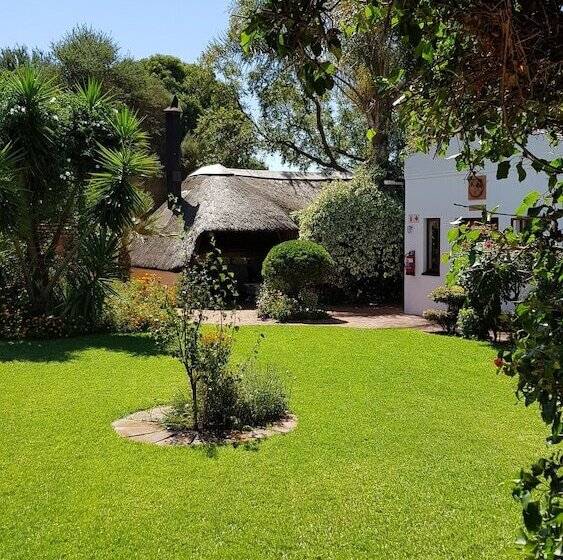 בית מלון כפרי Blue Mango Lodge