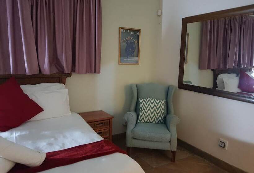 בית מלון כפרי Blue Mango Lodge