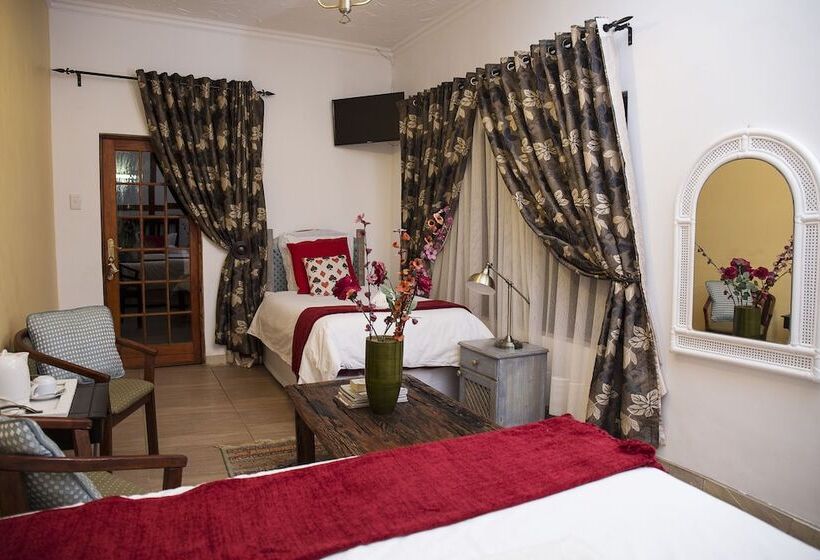 בית מלון כפרי Blue Mango Lodge