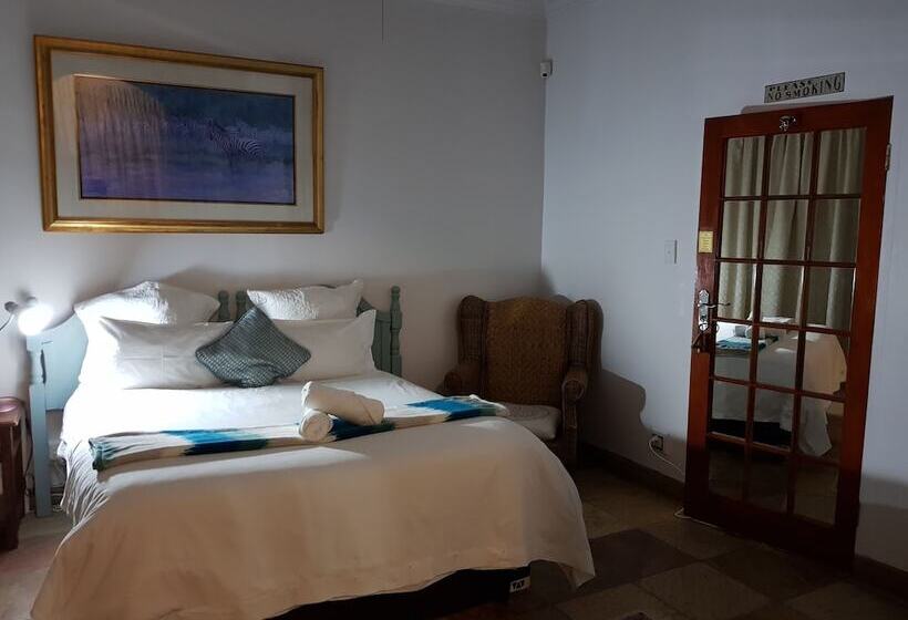 בית מלון כפרי Blue Mango Lodge