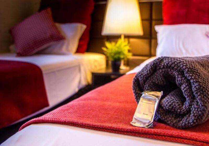 فندق على الطريق Ascot Budget Inn & Residences