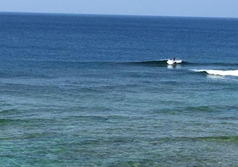 בית מלון כפרי Sunset American