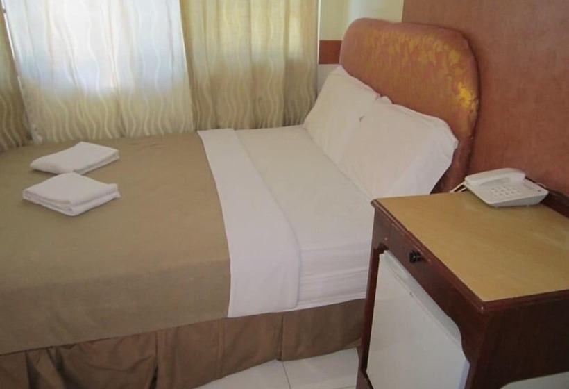 酒店 Golden Stallion Suites