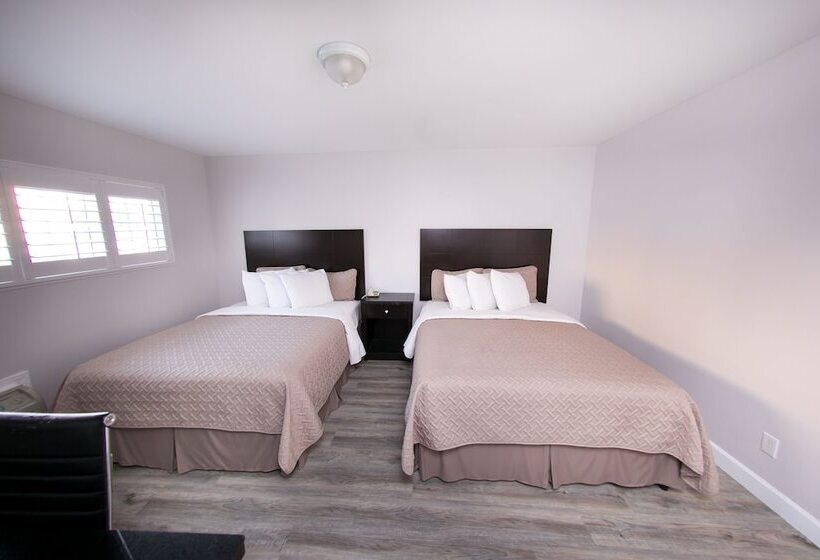 فندق Metropolitan Inn & Suites