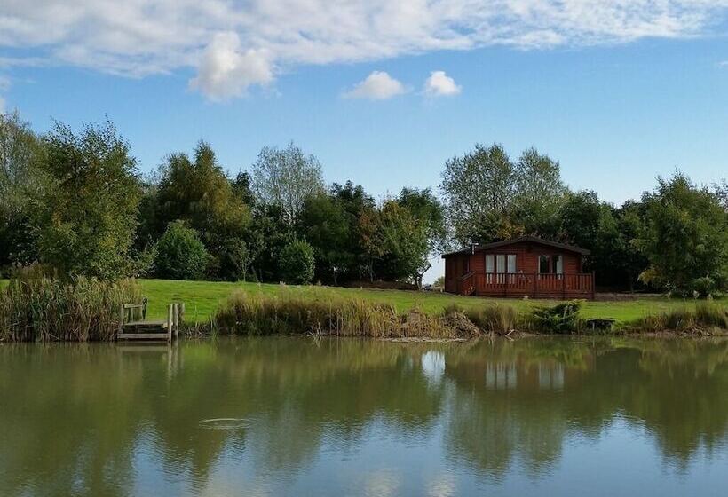 The Log Cabin Glebe Farm