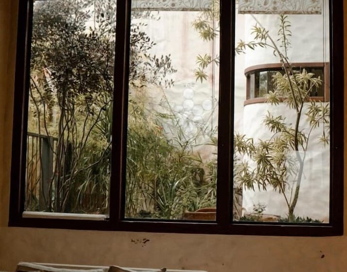 호텔 Le Jardim Pousada