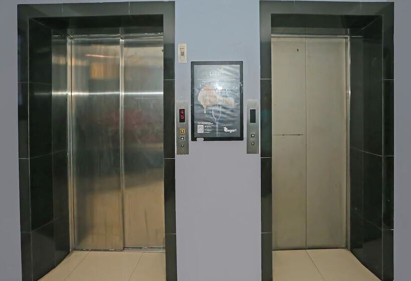 Отель Capital O 92625 19 Avenue Apartment