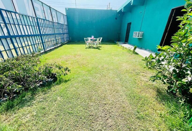 Отель Oyo 81144 Green Land Guest House