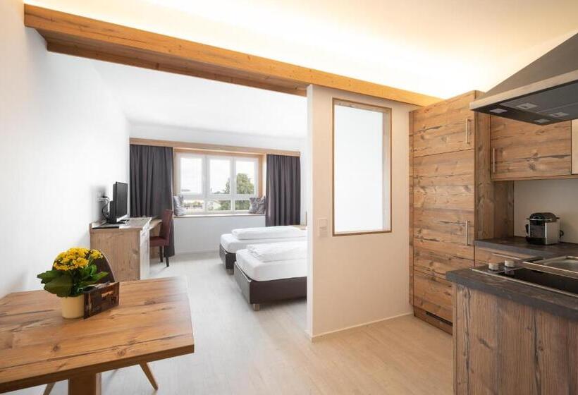 Отель Snooze Apartments