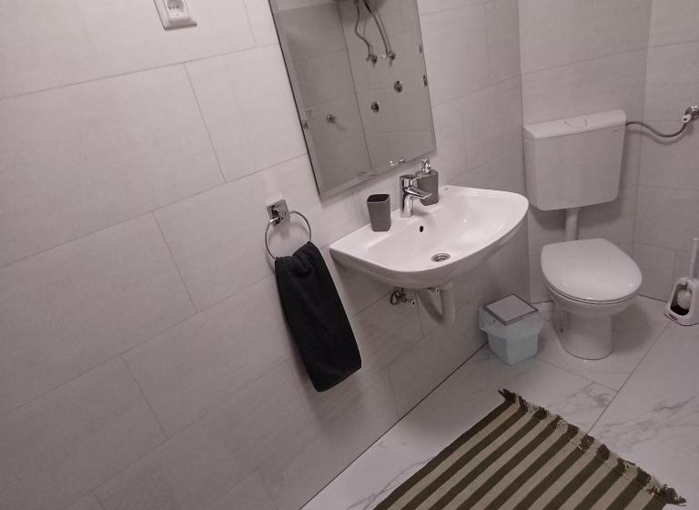 تختخواب و صبحانه Rose Apartmans