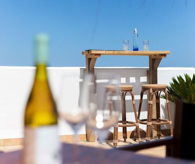 펜션 Hostal Cala Llombards