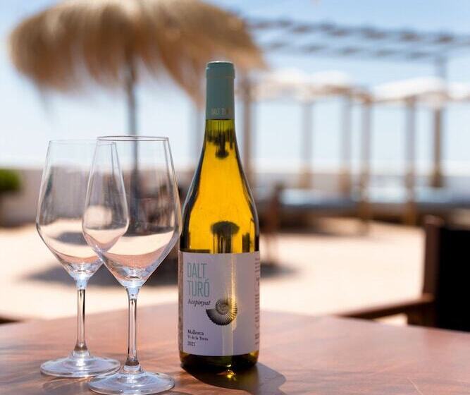 펜션 Hostal Cala Llombards