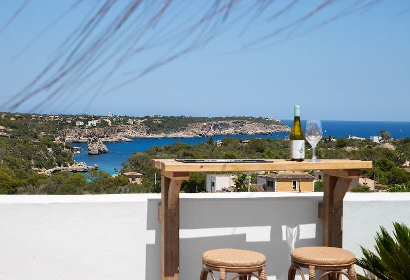 펜션 Hostal Cala Llombards