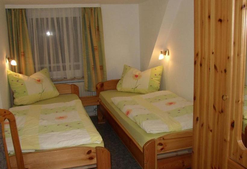 Отель Gästehaus Nis Puk Und Ferienwohnungen