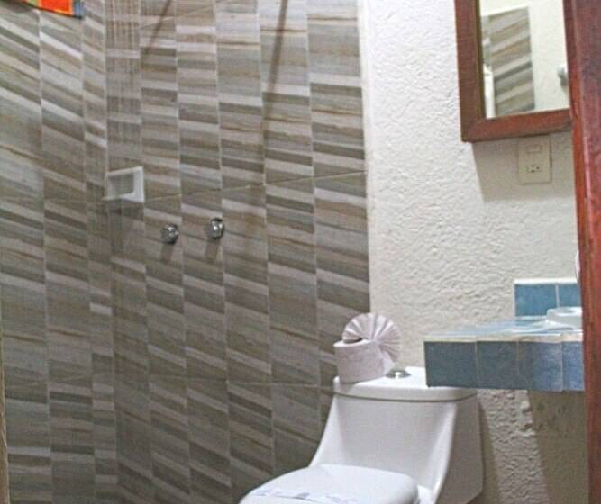 Отель Arrecife Huatulco Plus