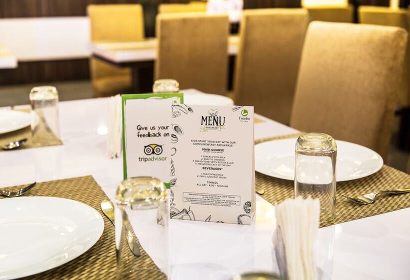 Отель Treebo Globe International