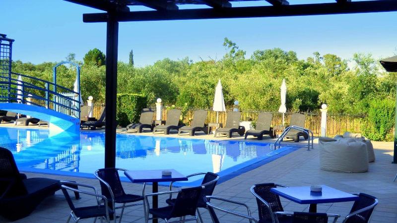 Отель Nikos Villas