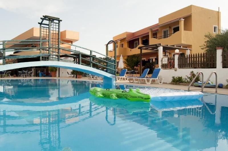 Отель Nikos Villas