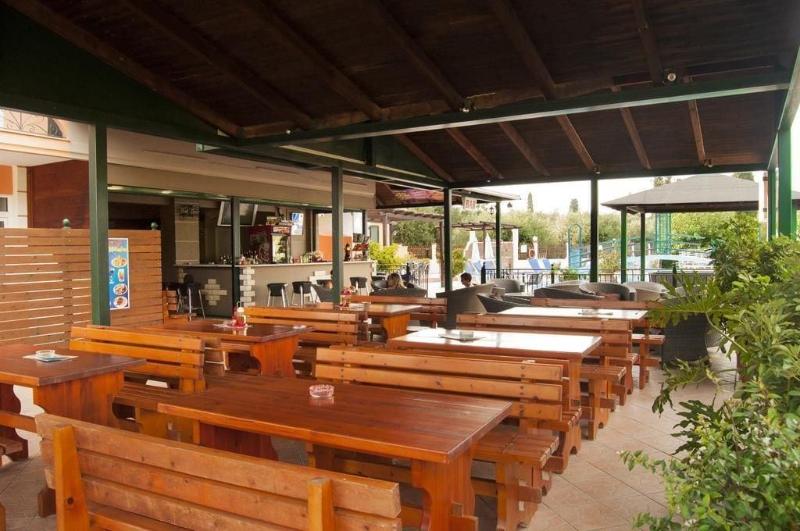 Отель Nikos Villas